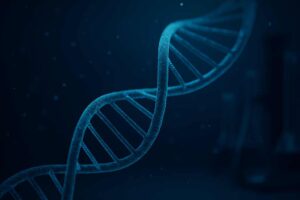 Abstrakcyjne przedstawienie podwójnej helisy DNA w niebieskich tonach symbolizujące genetyczne badania